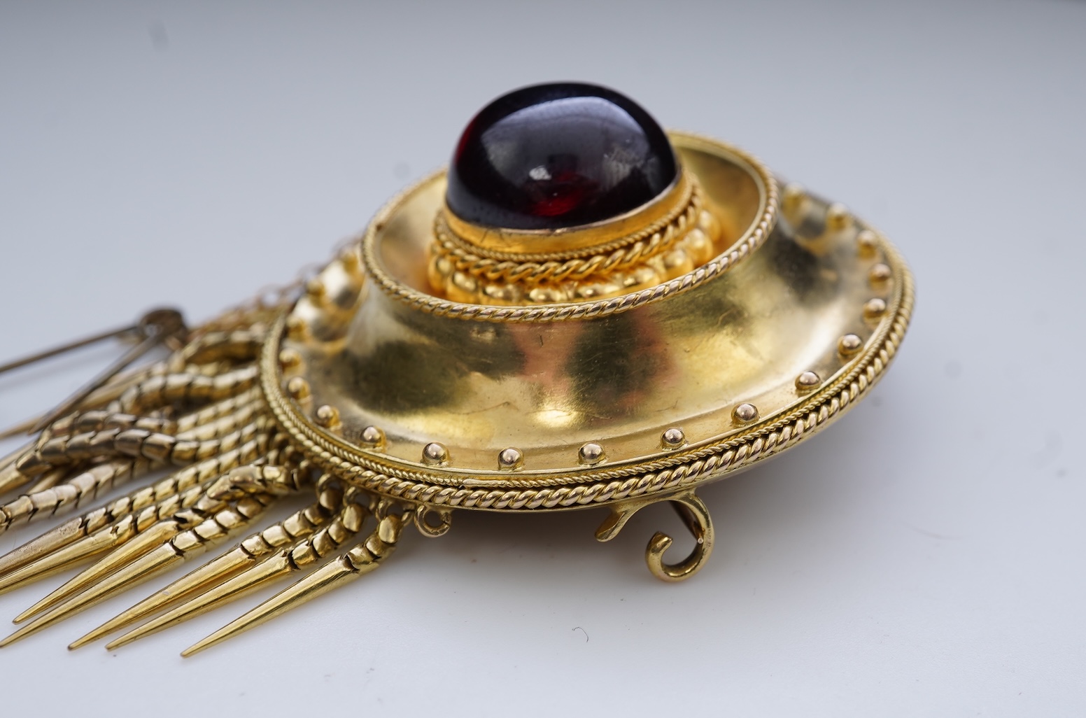 A Victorian garnet pendant/brooch, third quarter 19th century